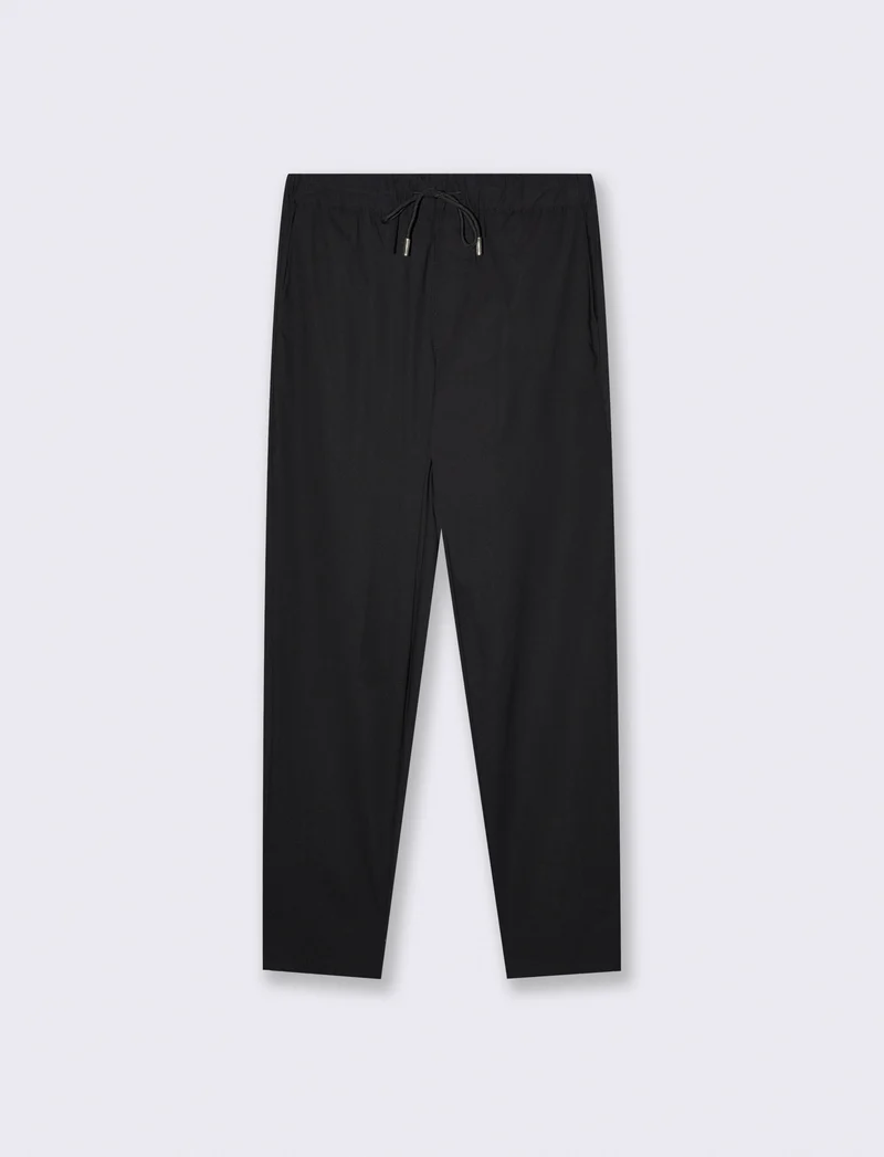 Pantaloni chino jogger uomo in tessuto tecnico - Nero